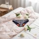 Period panties for moderate flow, with colorful flowers on dark blue base