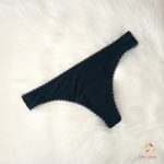 Black period panties in thong style, with white lace