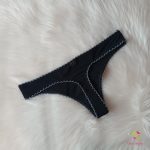 Black period panties in thong style, with white lace
