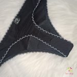 Black period panties in thong style, with white lace