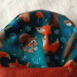 Erdei állat mintás, megkötős gyerek sapka